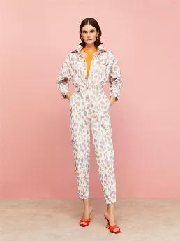 <p>Lapel collar jumpsuit with long sleeves and snap button cuffs. Front flap and side pockets. Self-belt with snap buttons. Back elastic waistband and rubber detail. Pleat detail at hem. </p>
<p>Solar Contrast: We are creating a brave new world with casual contrasts and complementary innovative forms. Leopard print has never been this functional before! Distressed leopard spots meet scorched orange in details.</p>
<p>100% Cotton</p>
<p>Hand Wash Cold; Do Not Tumble Dry; Iron Low; Dry Clean</p>
<