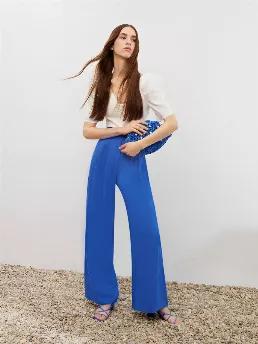 <p>High-waisted wide leg pants with front pleats. Side pockets and contrasting stitch detail. Front button and zip closure.</p>
<p>Marine:From the depths of Marine Blue, we are going on an overseas expedition. A cool breeze embraces deep blue hues and sea shells. Elegant details create a brand new siren with lush hybrid pieces. Feeling comfortable is a must but refreshing your style with innovative new forms is priceless.</p>
<p>65% Viscose 35% Linen</p>
<p>Hand Wash Cold; Do Not Tumble Dry; Iro