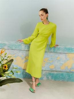 <p>Round neck long sleeve midi dress. Hidden in-seam zip closure. Crop and ruching detail at waistband.</p>
<p>Reflections: Effortless style is always vibrant! We're in the flow along with the loudest and brightest colors! Pink, blue, acid yellow hues coupled with sparkly denim touches are the kind of luxury we are going for! Flowy chiffon dresses and solid suits will give you a style upgrade while comfy fits will elevate your mood.</p>
<p>74% Tencel Lyocell 26% Linen</p>
<p>Hand Wash Cold; Do N