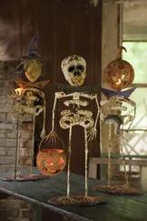 Let this set of three spooky characters welcome guests to your home this Halloween season.