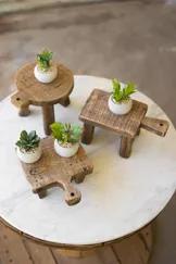 Perfect for displaying small succulents or trinkets, these cutting board risers are a great addition to any bohemian room.