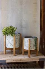 Set Of Two Pressed Tin Planters With Wooden Bases