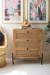Woven cane drawers hide all the clutter or clothes you can fit in this bedside table. This piece makes a gorgeous accent alone or paired with other cane and wood accents in a dorm room or smaller space. Use it for beautiful storage anywhere.