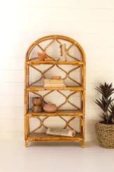 Need a bigger bookshelf? This rattan four-tiered shelf is the perfect solution to your current clutter problem. In beautiful woven rattan, this shelf is a display piece that fits a dorm room or guest bedroom.