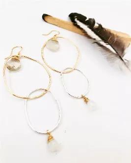 <p>Silver and gold hammered hoops with quartz accents. Approx 3.5"? long. </p>