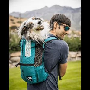 <p>The Trainer is an affordable, easy to use, entry-level backpack dog carrier. Available in sizes XS-L, it is ideal for smaller breeds, dogs that are still growing, training, and learning to socialize. Available in a variety of bright color options, the trainer should be used for short, non-strenuous activities like short walks, hikes, public transportation, and other similar activities. This carrier fits most comfortably? on dog owners with a small to medium build.</p>
<p><strong>For Dogs Rang