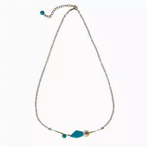 <p>Step out for a night on the town with the fun and funky Corfu Necklace. Made from tagua and acai. Adjustable, 20-22". Available in Sunset, Sea Breeze, and Turquoise. Proceeds support Helping Hand Artisans, HHPLIFT's global artisan network. Benefits have included clean water, free education, safe transportation, micro-loans, disaster relief, and more.</p>
