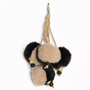 This tassel has four 2-tone pom-poms, suede, and beads. Available in 4 color combinations. Colors: black/tan, gold/teal, light blue/pink, and slate/white