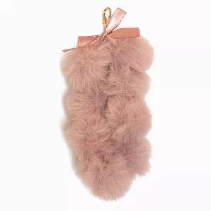This elegant pom-pom tassel is available in 5 colors. A group of poms hanging on a chain with a silk bow. Add a bit of sophistication to any of our bags. Colors: black, cream, gray, pink and multi.