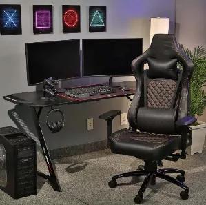 Elevate your gaming experience with the Element Gaming Chair. Perfect for enthusiastic gamers who want to upgrade their gaming setup or anyone looking to enhance their workspace. This racing-style chair features contoured shape padding, full adjustment ergonomics, and a leather exterior that's easy on the eyes and deluxe to the touch. The cross-functional design features lumbar support and headrest and tilts up to 175 degrees for comfortable playing positions throughout your longest gaming sessi