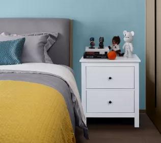 This compact piece showcases a clean-lined silhouette with two spacious drawers. Perfect as a perch for a clock and accent lamp, or as handy additional storage, this nightstand offers practicality and traditional design. The space-saving design and neutral color will blend well with any furniture.