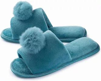 Joan Vass has you covered with the most current looks and must-have styles. What you want, what you need, what you can't live without. Winter just got better with those cute cozy faux fur pom-pom slippers! Go ahead. Slip your weary tootsies into these pampering scuffs. You'll wonder where they've been all your life!<br><br>HIGH QUALITY &amp; WELL-MADE: Our slippers are built to last. They are made of high-quality and superior plush faux suede material. The high-density foam is adaptable to your 