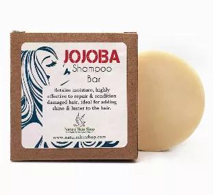 The Jojoba Shampoo bar is the perfect way to give your hair the nourishment it needs. Made with organic jojoba oil, this bar will help to retain moisture and repair any damage that your hair may have. Scented with a revitalizing blend of rosemary, fresh garden herbs, and mint, this bar is perfect for dry, damaged hair. The shampoo bar lather is incredible, the bar is long lasting, I have shinier hair with zero buildup, and it's all natural!