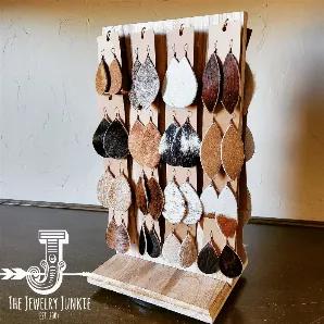 <div >
<div  >Genuine Leather Hair-On-Hide Earring Starter Packs</div>
<div  >are the perfect way to get</div>
<div  >started selling our boho earrings at discounted prices!</div>
<div  >Set comes with </div>
<div  >32 pairs of earrings</div>
<div  >and a wood rotating display with 32 hooks</div>
<div  ></div>
<div  >Display is shipped in two pieces (top and bottom) which assemble easily</div>
<div  >Hooks come with the display and will need to be screwed into pre-drilled holes.</div>
<div  ></d