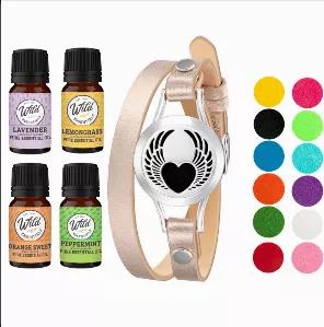 <p>Winged Heart bracelet aromatherapy diffuser kit with rose gold leather band, 12 vibrantly colored refill pads so you can customize the color and look of your bracelet and comes with a 5ml bottle of lavender, lemongrass, orange sweet and peppermint pure, made in the USA essential oils.</p>

