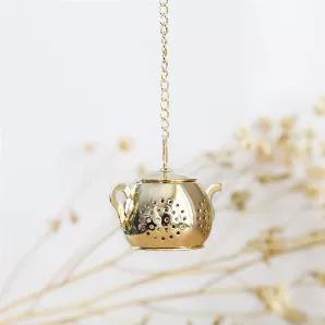 <p><span>This magnificent tea infuser is so cute and elegant. It is perfect for simmering loose tea leaves in a cup while you admire this little gold pot! Ditch the traditional tea bags and go zero-waste on enjoying your tea. </span></p>
<p><span>Features <br> Reusable <br> Fills 1-2 tsp of tea leaf <br> Chain hook <br> Weight 20g </span></p>
<p><span>Materials <br> Stainless Steel </span></p>
<p>Sustainably<span> sourced from China</span></p>
