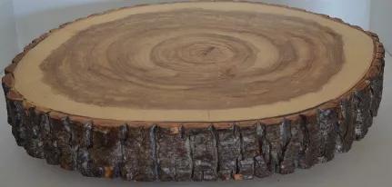 <p>Large Log Slice slab with bark, hand crafted by us here in the Western Mountains of Maine with Balm of Gilead Logs. Has 4 log legs.</p><p><strong>Great for Cake Stands, C<span data-mce-fragment="1"><b data-mce-fragment="1">harcuterie</b> <b data-mce-fragment="1">board,</b></span> Cutting Boards, Serving Platters or Center Pieces</strong></p><p>The Log Slices are 1 1/2" to 2 1/2" Thick</p><p>The Log Legs are 1 1/2" long.</p><p>Kiln Dried Log Slice, that won't Crack, Mold, or lose it's Bark.<br