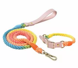 **Matching Luxe Royal Pink Leather Dog Rope Leash and Collar Set**<br>- 100% hand woven cotton rope, spliced and whipped on one end for maximum strength <br>- Solid brass hardware for maximum durability.<br>ABOUT<br>Our leashes are hand-dyed, spliced and stitched to withstand pulling, tugging and chewing. Fixed on the end is a solid brass trigger snap designed to help keep your pup safe and untangled. We finish each Original Cotton Rope Dog Leash with a single brass O-ring to hang accessories su