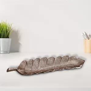 Do you want a tray which is away from the normal? This handmade designer tray is one of its kind. Made up of aluminium, this bronze leaf shaped tray is absolutely different from the rest, that is why it leves a mark on the buyers.