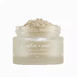 The Athar'a Pure Multan Acne Healing Mask is the answer to serious acne, especially cystic acne! Two powerful clays, along with activated black charcoal and lavender make up this highly effective acne healing mask. <br>
Multani Mitti literally meaning, sand of Multan and Bentonite Clay, deeply cleans pores, remove blackheads, heals inflamed skin and treats cystic acne.<br>
This Acne Clay Mask will have a pulsating effect on skin as it tightens and cleans deep into pores.<br>
Activated Black Char