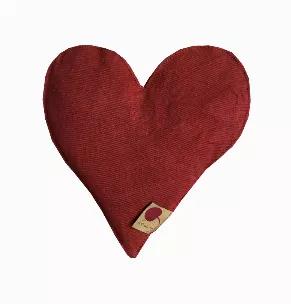 <h4>Natural-dyed 100% cotton denim</h4><p>Warm a heart or warm a bed with our new Heart-Shaped pillow. It's perfect for muscle soreness, aching knees, a congested chest, abdominal cramps or simply relaxing warmth.</p><p>The Heart-Shaped pillow is soft, durable and dyed with a natural red dye, derived from macadamia tree bark. Minimally packaged in poly-bag with hangtag.</p><ul><li>All Hot Cherry pillows are machine washable follow instructions carefully and they will last for years!</li><li>Hot 