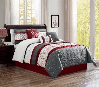 This Comforter Set is made from quilted horizontal stripes with multi solid coloured bands and a floral embroidered design. Coming with 6 additional pieces, this set brings a touch of class to any room.  Set includes 1 comforter, 1 dust ruffle, 2 pillow shams and 3 decorative pillows. Transitional to fit any home's style. 106x92 in color Red