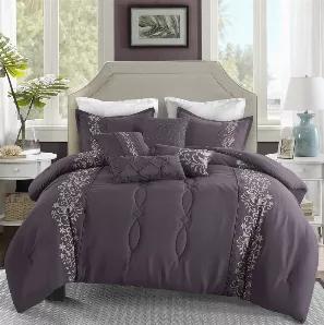 If you are looking to update your bedroom space, the place to start is with its primary asset, the bed!  This 7 Piece Comforter Set is a modern collection with a striking quality. Each piece is intricately stitched with an abstract, design. This collection's intriguing design, with vibrant colors and sharp lines, combine for a simple yet bold style. This set includes one cozy comforter, two pillow shams, Bed Ruffle and 3 Decorative Pillows, offering an easy and effective way to update your perso