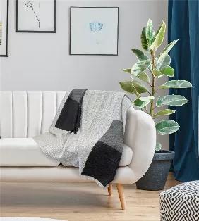 Soft & Cozy Knitted Throw Blanket is made of super soft, durable, breathable and so comfortable.  Perfect for daily use when watching TV, reading on a couch, lounging in a chair or a bed.  You"ll be nice and warm without getting too hot. This Throw is perfect decor piece, over a chair or couch, or keep it in the car or the luggage in case you need it when traveling. Lightweight Warmth, this Knit Throw Blanket measures 50" x 60".  It provides the ideal lightweight warmth, sure to become your new 