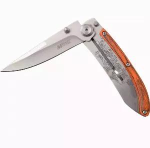 The MTech MT-1151PDR is a manual folding knife for everyday carry. The 1151PDR features a 3CR13 stainless steel, drop point blade. The handle is made of stainless steel with a wood mount that features a frame lock mechanism. The handle liner has a bead blast finish and Japanese inspired dragon artwork. It comes with a stainless steel pocket clip.