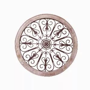 Add a distinctive touch to your home d?cor with this eye catching wall d?cor, featuring distressed details. Reflecting a countryside charm, this round wall d?cor feature rustic brown intricate metal scollwork with tudor rose center and secured by cream finish wooden framing. It exhibits impressive artistry and perfectly blends with any color scheme. Without much efforts, you can hang this wall decor on any plain wall to add a great visual interest.