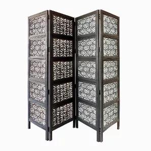 Add glorious charm to your living space with the addition of this utilitarian room divider, featuring see through traditional carvings. Connected through metal hinges, it features four panels which you can access as per your desired purpose. When not in use you can easily fold it and keep aside. It is constructed using Mango wood and MDF, accented with elegant black and washed white finish that perfectly blends with all d??cor styles. Set this room divider in any space conscious ensembles to mak