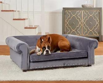 This is Summer, a 75 pound Boxer, comfortably lounging on one of our largest style sofas, the Jackson. Measuring 4 feet across, it is fully upholstered in smooth velvet with nailhead accents. The Jackson Sofa is made with durable and sturdy wood frame construction and boasts a high loft, memory foam cushion, so our large sized pets are offered some relief to aging and aching joints.<ul><li>Removable/washable cushion cover</li><li>Elevated on 2" legs for draft free sleeping</li><li>Fits the large