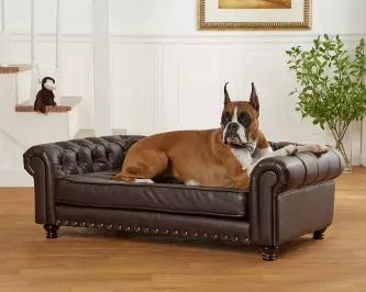 The Wentworth Sofa is a stately, generously tufted pet bed upholstered in charcoal grey velvet. It boasts a classic, tufted, rolled-arm and brasstone nailhead trim detail. Durable furniture grade construction with a solid foam cushion, it suits a medium dog who likes to lean while resting.<ul><li>2" legs lift bed off floor, keeping your pet draft free</li> <li>Perfect for pets who like to lean or curl when they sleep</li><li>Removable/washable cushion cover</li> <li>Fits pets up to 80 lbs</li><l