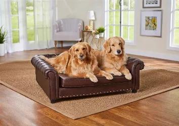 Chase and Riley, 2 lovable Golden Retrievers are quite at home on this Harrison Sofa. Among our largest styles, the Harrison offers durable, brown, pebble-grain faux-leather with high quality, furniture grade construction. Its classic look with rolled arms and tufted back makes this a favorite with the grandest sized dogs.<ul><li>2" legs lift bed off floor, keeping your pet draft free</li><li>Perfect for pets who like to curl, lean or stretch when they sleep</li><li>Easy to wipe clean with a dam