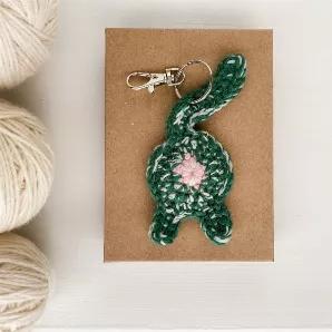 <p>Cats have always been our lucky friends! This hilarious cat butt keychain is everything a lucky charm needs. Everyone will notice your new good luck amulet, and hopefully, your days will stay positively advantageous. Long gone are the days of a poor rabbit&#39;s foot hanging off of your keys allowing you to rock your very own grass green cat butt.</p>

<p>GREEN LUCKY CAT BUTT KEYCHAIN</p>

<ul>
	<li>Hand crocheted out of luxurious 100% wool in a variety of yarn weights to create depth an