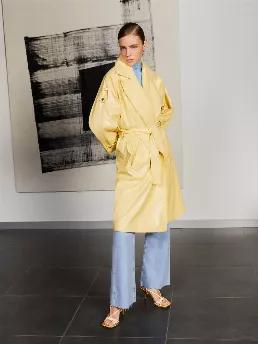 <p>Double breasted, relaxed fit trench coat with self belt. Back vent at hem. Side pockets, epaulettes on shoulders and sleeves. Interior lining.</p>
<p>Mix and Match: A collection that matches knitwear and denims with knitted and woven fabrics: It is a wonderful mix-and-match of unique designs. Casual styles in bright hues will bring a solution and a bright smile to your every day.</p>
<p>57% Polyurethane, 43% Polyester</p>
<p>Do Not Wash; Do Not Tumble Dry; Do Not Iron; Do Not Dry Clean</p>
<p