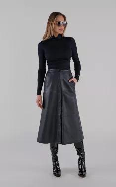 <p>This butter soft leather will elevate your skirt style this fall. Snap front closure. Pair with a fitted top or cozy sweater. Available in soft Navy and Black. Skirt is lined and has hip pockets.</p><p>Model wears a size small. Model Waist: 25", Hip: 36" We recommend going up one size from your usual for this style.</p><p>Leather has no stretch.</p>