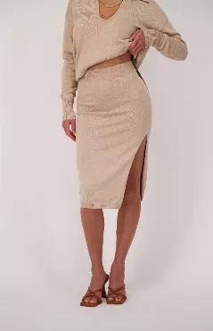 Crafted from a stretchy soft knit, this skirt will be your go to for all occasions. This knit is not sheer and hugs for that perfect body-con fit that doesnt stretch out as you wear it. Looks great with Tees, tanks and sweaters. A skirt essential. Elastic waist and side slit finish this style.</p>Fabric has stretch.</p>