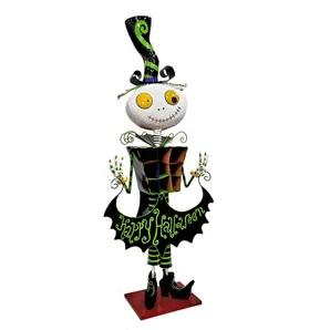 Bring all the fun and creativity of Halloween into your store with 'Antonio", the mischievous, top hat wearing skeleton (who looks like he belongs in a Tim Burton film). Put him on display outside your front entrance to attract customers of all ages or right by your register to wish your guests a "Happy Halloween"! - Indoor & outdoor safe - Powder coated iron - Hand painted with glossy finish - Vibrant colors - Free-standing with flat base - Holds "Happy Halloween" sign shaped like bat wings<br>