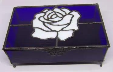 <div><div><div><span>A special jewelry box for your precious jewelry. Stained glass white rose jewelry box with black patina finish. Inside is partitioned into 3 compartments and lined with black felt and ring holder. </span></div></div><div><div><div><div><ul><li><span>Black patina finish.</span></li><li><span>Approximately 5 wide x 8 long x 3 high with feet.</span></li><li>Due to the nature of stained glass color and characteristics may not be as pictured.<br></li><li><span>Please allow one we