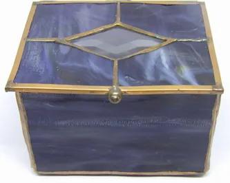 <div><div><span>This stained glass trinket box is great to keep your special treasures. Stained glass basic trinket box with copper patina finish. Small clear glass bevel insert on lid. </span></div></div><div><div><div><div><ul><li><span>Copper patina finish.</span></li><li><span>Approximately 4 wide x 5 long x 3.5 high with feet.</span></li><li>Due to the nature of stained glass color and characteristics may not be as pictured.<br></li><li><span>Please allow one week for us to handcraft your i