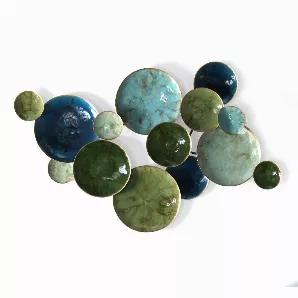 Surround yourself with the magnificent colors of the Mediterranean with the Mykonos Metal Wall Decor by Stratton Home. A handcrafted collage of metal discs of varying sizes in rich blue, gold, and green hues come together to form this eye-catching dimensional design. The sizable wall art measures 39.5" W X 3.25" D X 28.75" H and adds a striking touch to any wall space. Sit back, relax, and get ready to feel transported to the islands of Greece.<br>