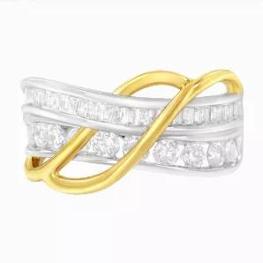 Bold and unique, this ring is fashioned in 10k white and yellow gold. 1 1/10ct TDW of diamonds are displayed in this design. A cool white gold ring band splits and is inlaid with a row of glittering baguette diamonds and one row of round cut diamonds. From the edge of the band two yellow gold ribbons emerge and bypass over and under the diamond inlaid band to merge on the opposite edge of the ring.