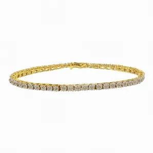 This timeless tennis bracelet glimmers with round brilliant cut diamonds set along a band crafted in yellow gold plated sterling silver, this classic design will last a lifetime. It has a striking total diamond weight of 5 carats.