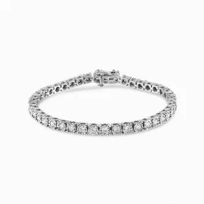 Elegant and timeless, this gorgeous pure 92.5% sterling silver tennis bracelet features 3 carat total weight of round diamonds. The bracelet features unique illusion-settings with miracle-plates that center each genuine diamond in a mirror-finish, high-polish frame. Modern yet antique-inspired faceted bezel settings give the illusion of much larger stones, magnifying the sparkle. The 7"-7.25" bracelet has a box-with-tongue and safety clasp fastener and is crafted of real 925 sterling silver that