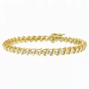Here's a gift with plenty of sparkle to spare! Each rounded diamond in this stunning one carat bracelet is connected by shimmering, raised yellow gold links, creating an 'S' shape all the way around for an unforgettable presentation.