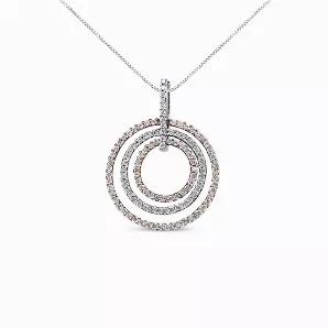 Classic meets contemporary for a chic contrast! This eye-catching pendant flaunts an endless loop of 14 karat white and yellow gold rings, which sparkle with one carat of round diamonds, adding a touch of glamour.