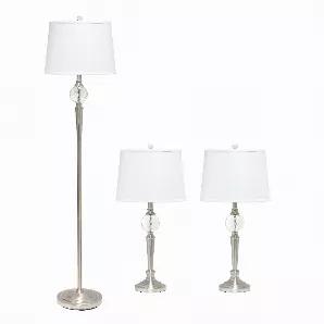 This luminous 3 piece lamp set consists of two table lamps and an identical floor lamp.  Finished in brushed nickel throughout its base, a prism like crystal is featured at the top just below the white empire shades included.  Designed to compliment a simple yet sophisticated interior design, you can't go wrong with this purchase! 