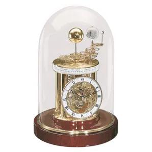 The highly accurate quartz regulated Astrolabium features a calendar and zodiac disc and individual representations of the sun, moon and Earth. Through the visible highly intricate gear train system, the Astrolabium clock reproduces the annual orbit of the earth around the sun, with the earth rotating around its own axis once in 24 hours and the moon revolves around the earth in 29.5 days, completing a full rotation around its axis. In the course of one year, the earth passes all twelve zodiac s