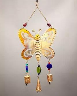 These Butterfly Chime hanging are sure to make a fantastic addition to your home decor adding a lot of color in any given room, and spreading a very positive and joyous vibe. <br><br><br> It's handmade by the artisans using metal scraps, and thus it is very sustainable. Many of our customers love to use it as a decorative wall hanging.<br><br>Height: 12.5"<br><br>Width: 7.25"<br><br>Drop: 5"<br><br> Material: Iron with Glass Beads and Tin Bells